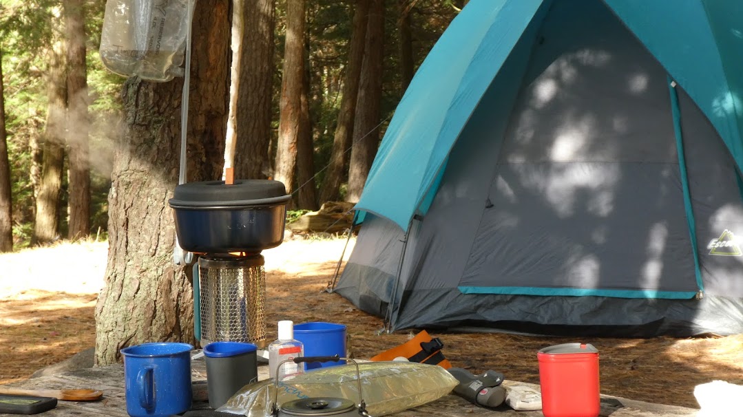 picture of some of the essentials that you need to take with you when you are camping or hiking