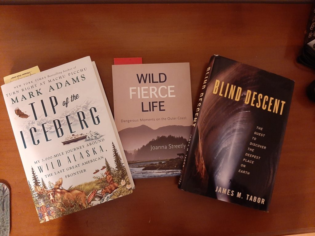 picture of outdoor adventure books for camping enthusiasts - Tip of the Iceberg, Wild, Fierce Life and Blind Descent