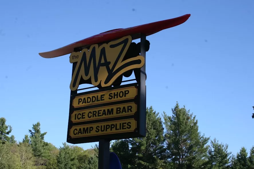 picture of the sign at The Maz paddle shop, ice cream bar and camping supplies outside of Bon Echo Provincial Park near Cloyne Ontario
