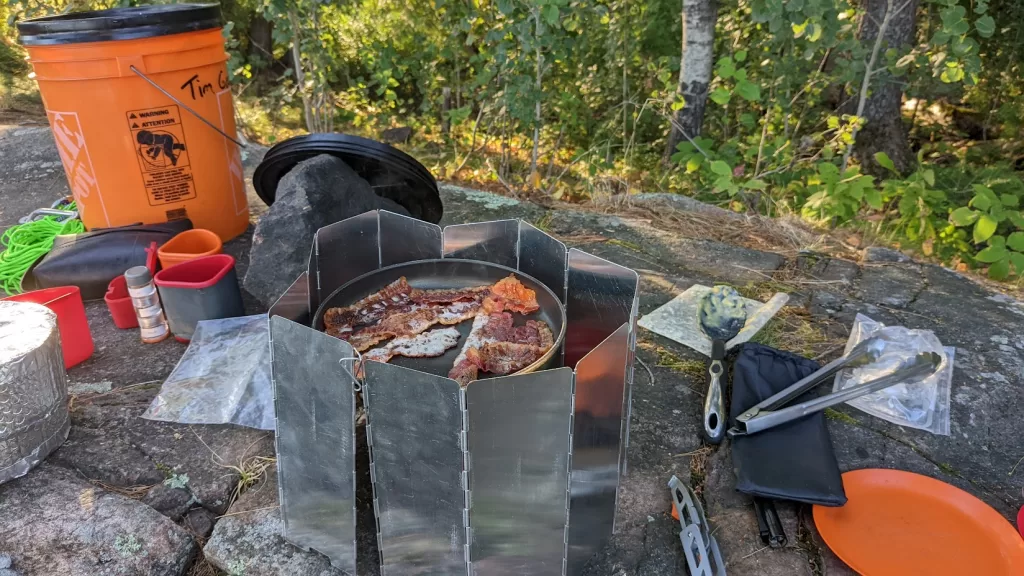 picture of backcountry camp cooking with a reflector oven